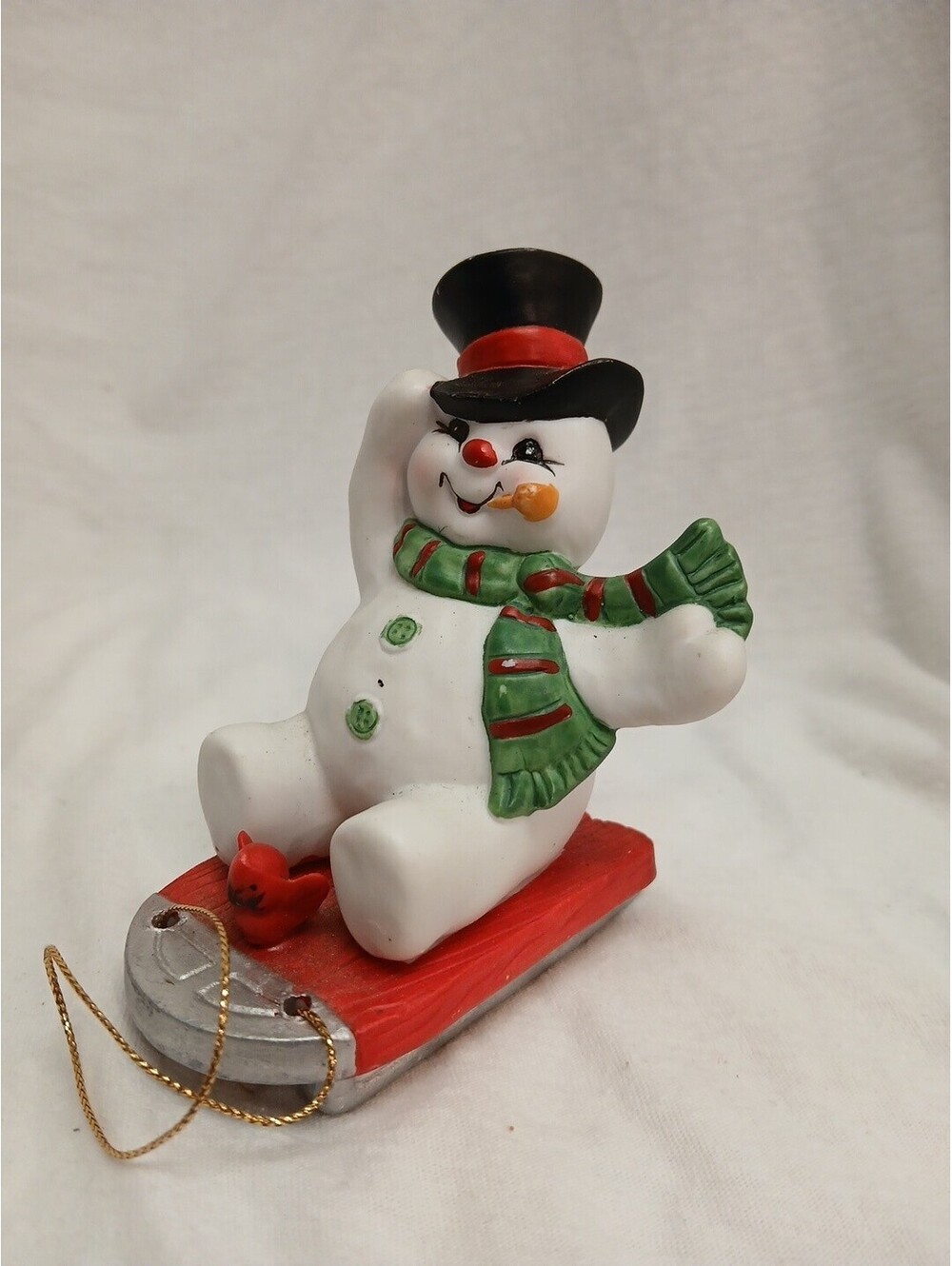 Vintage Enesco Frosty the Snowman on Sled with Cardinal Figurine, 1990